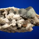 Phenakite on Quartz var. Smoky and Calcite - image 3
