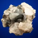 Phenakite on Quartz var. Smoky and Calcite - image 5