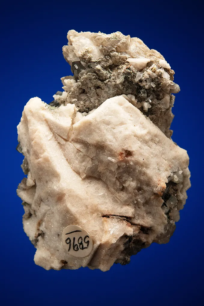 Phenakite on Quartz var. Smoky and Calcite - image 2