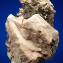 Phenakite on Quartz var. Smoky and Calcite - image 2