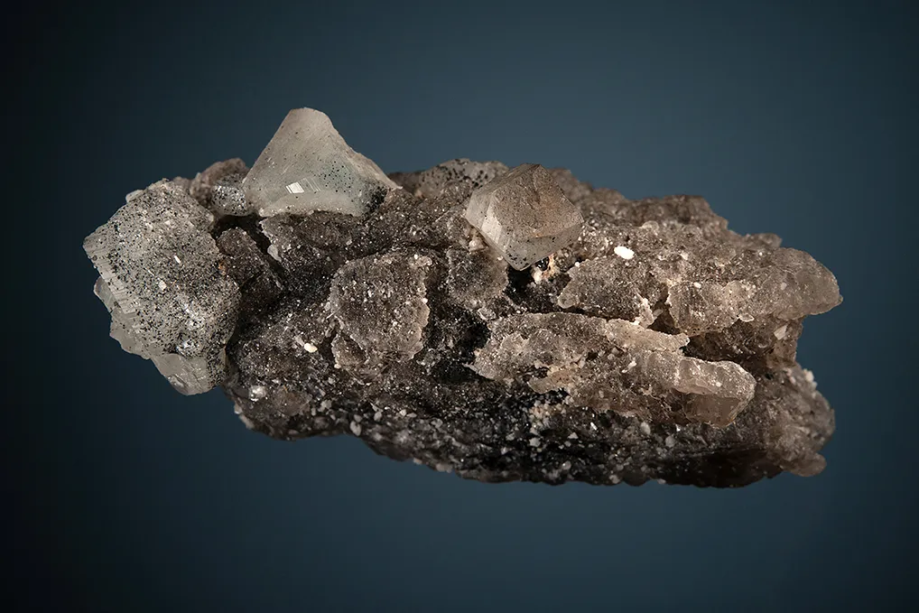 Phenakite with Hematite on Quartz - image 4