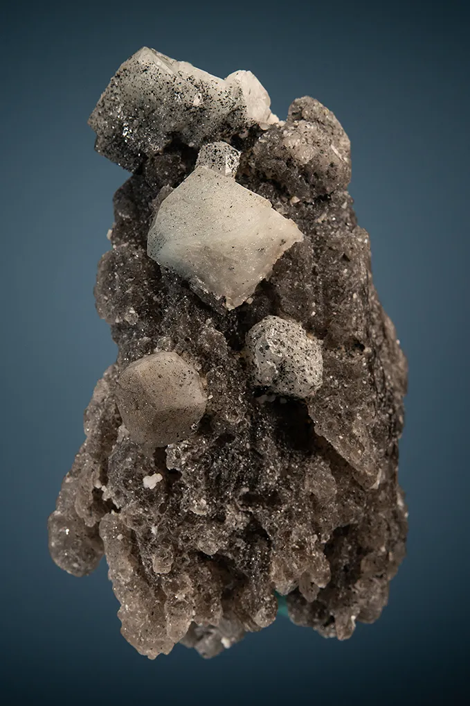 Phenakite with Hematite on Quartz image