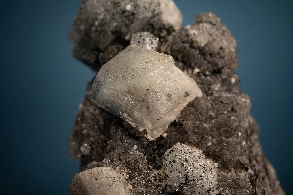 Phenakite with Hematite on Quartz - image 3