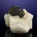 Phlogopite Mica on Orthoclase Feldspar - image 1