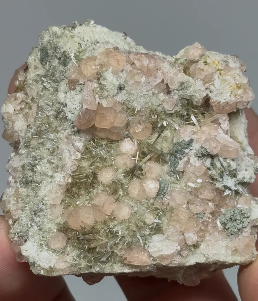 Pink Garnet with Diopside on Matrix image
