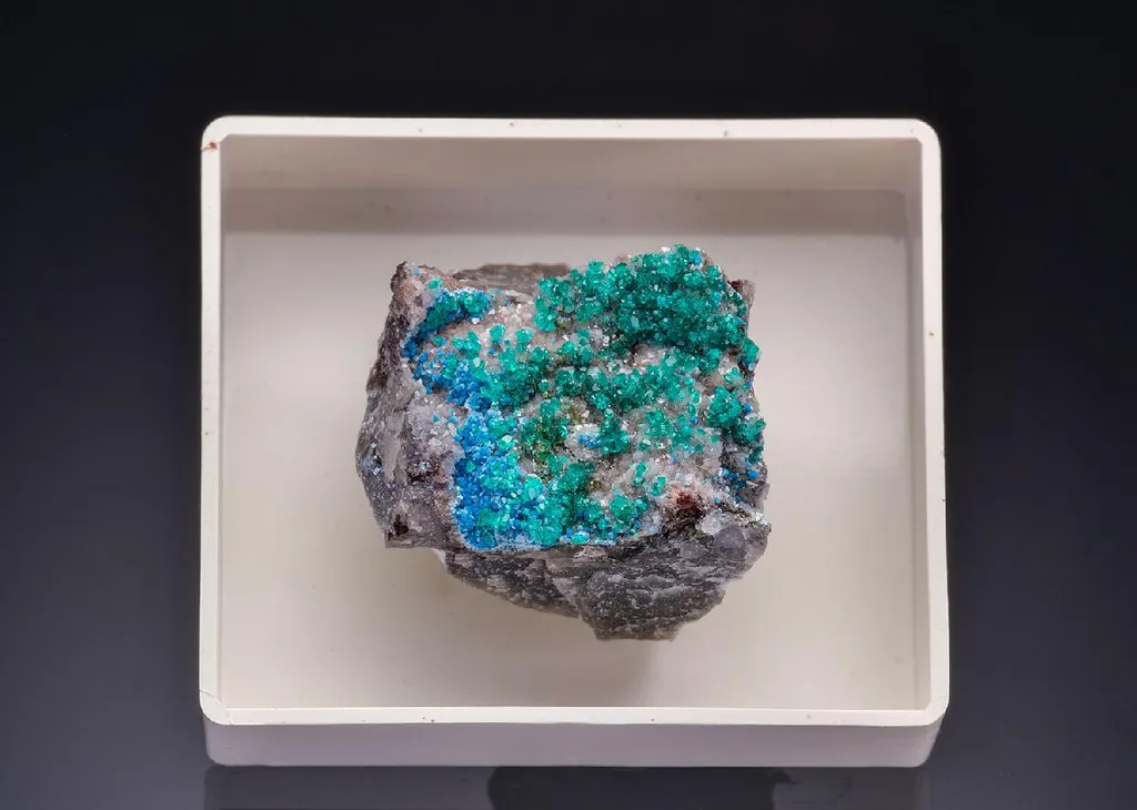 Plancheite with Dioptase Duftite on Calcite image