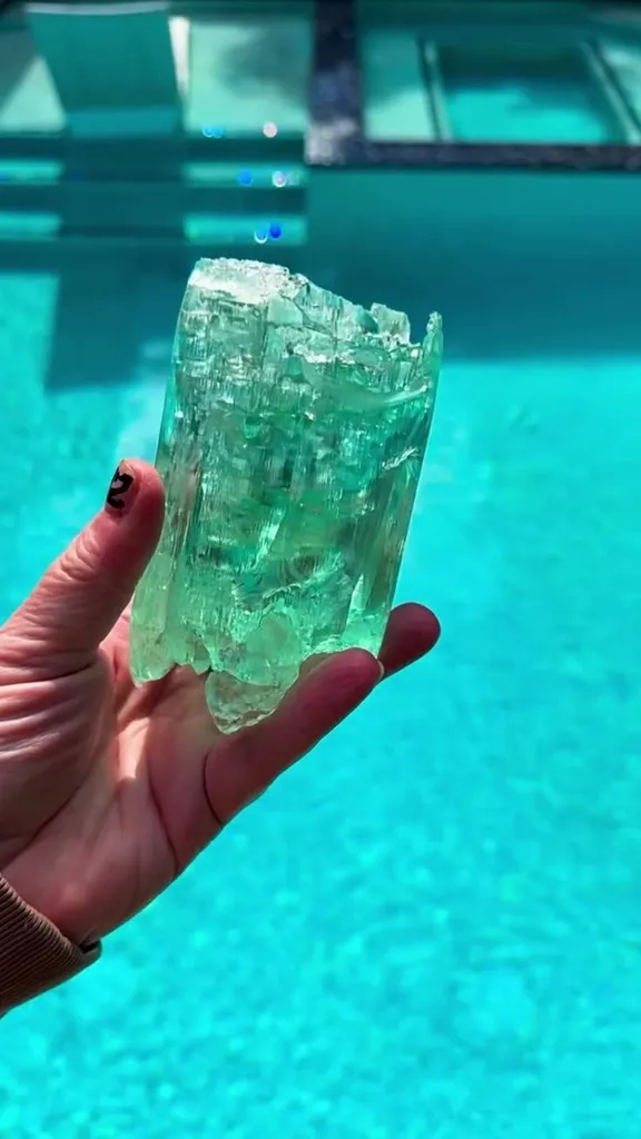 Poolside with one of the wildest Aquamarines I’ve ever handled image