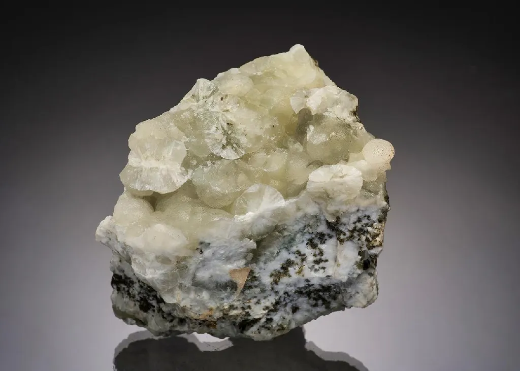 Prehnite with Greenockite image