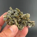 Pyrite after Pyrrhotite with Calcite - image 1