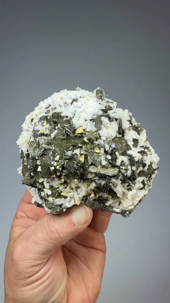 Pyrite after Pyrrhotite with Calcite - image 2