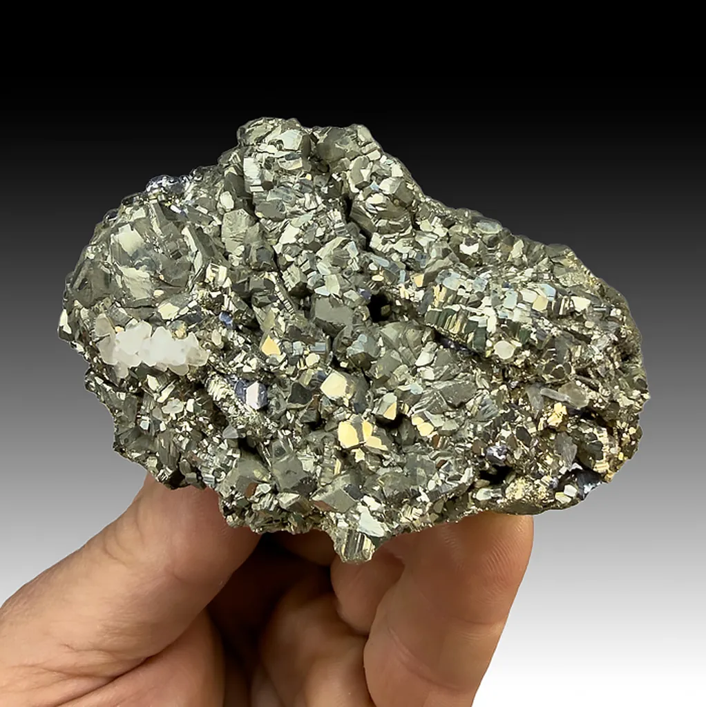 Pyrite after Pyrrhotite with Calcite image