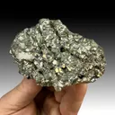 Pyrite after Pyrrhotite with Calcite - image 1