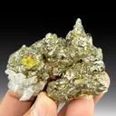 Pyrite after Pyrrhotite with Calcite - image 1
