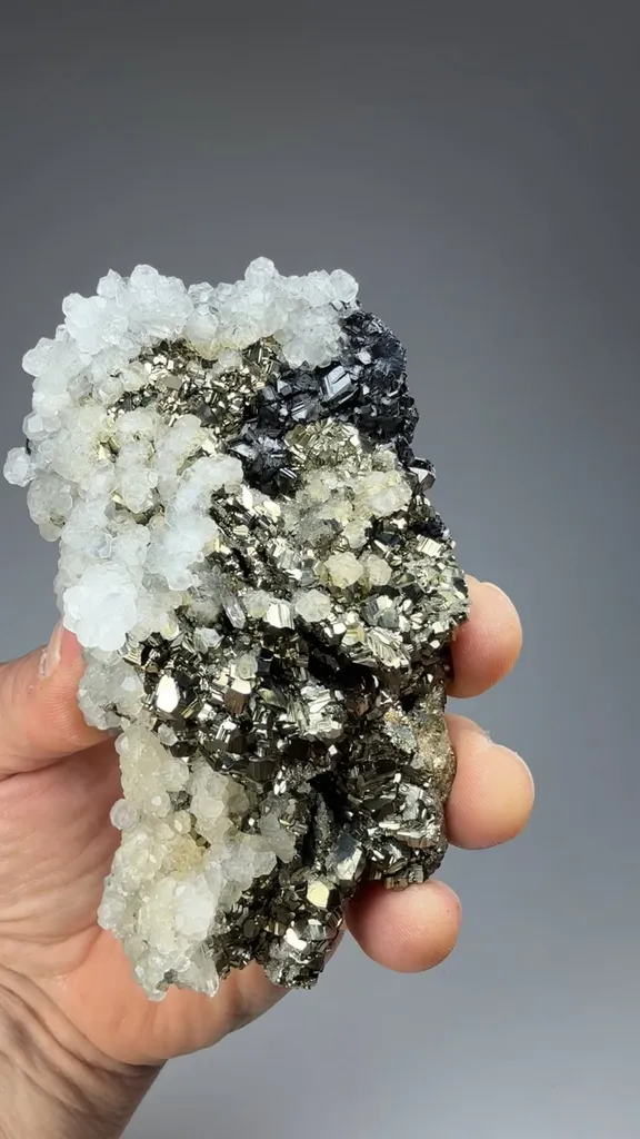 Pyrite after Pyrrhotite with Calcite image