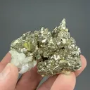 Pyrite after Pyrrhotite with Calcite - image 2