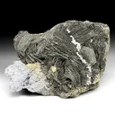 Pyrite after Pyrrhotite with Calcite, Rhodochrosite - image 1