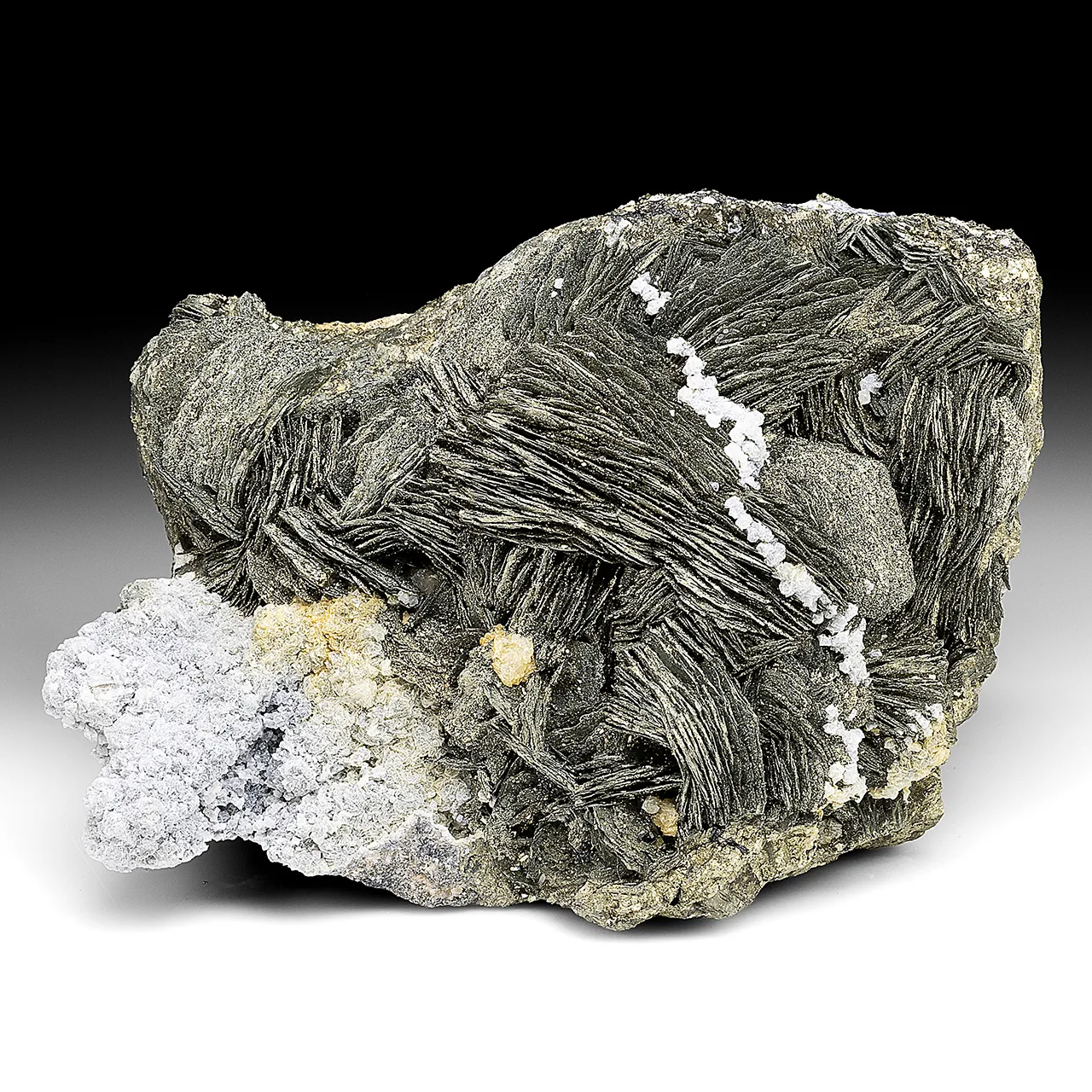 Pyrite after Pyrrhotite with Calcite, Rhodochrosite - image 1