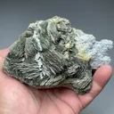 Pyrite after Pyrrhotite with Calcite, Rhodochrosite - image 2