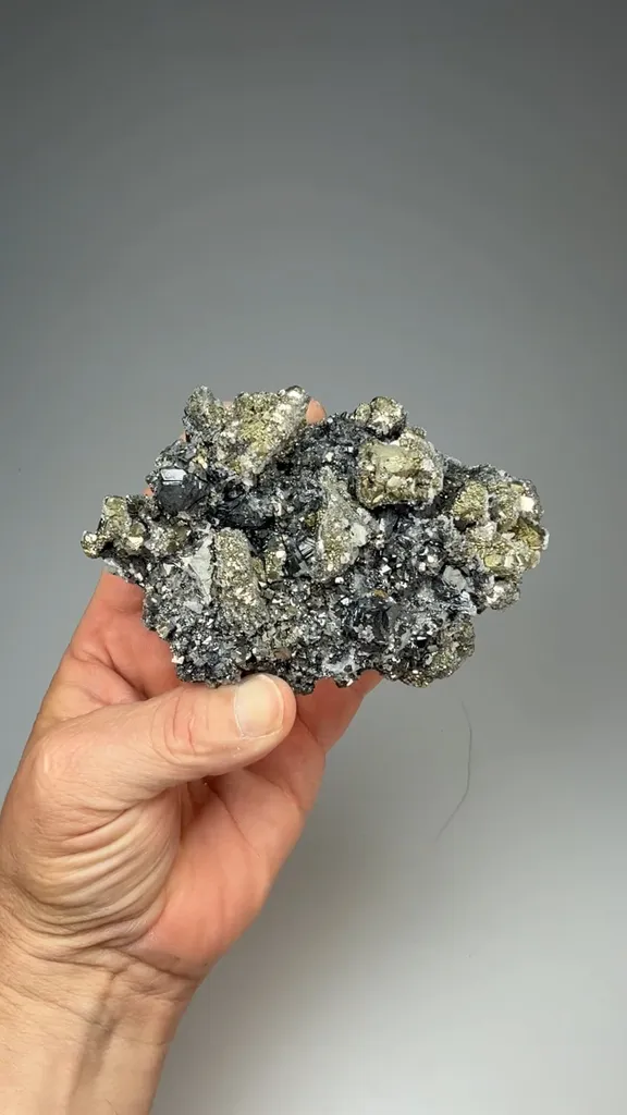 Pyrite after Pyrrhotite with Calcite, Sphalerite image