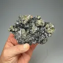 Pyrite after Pyrrhotite with Calcite, Sphalerite - image 1