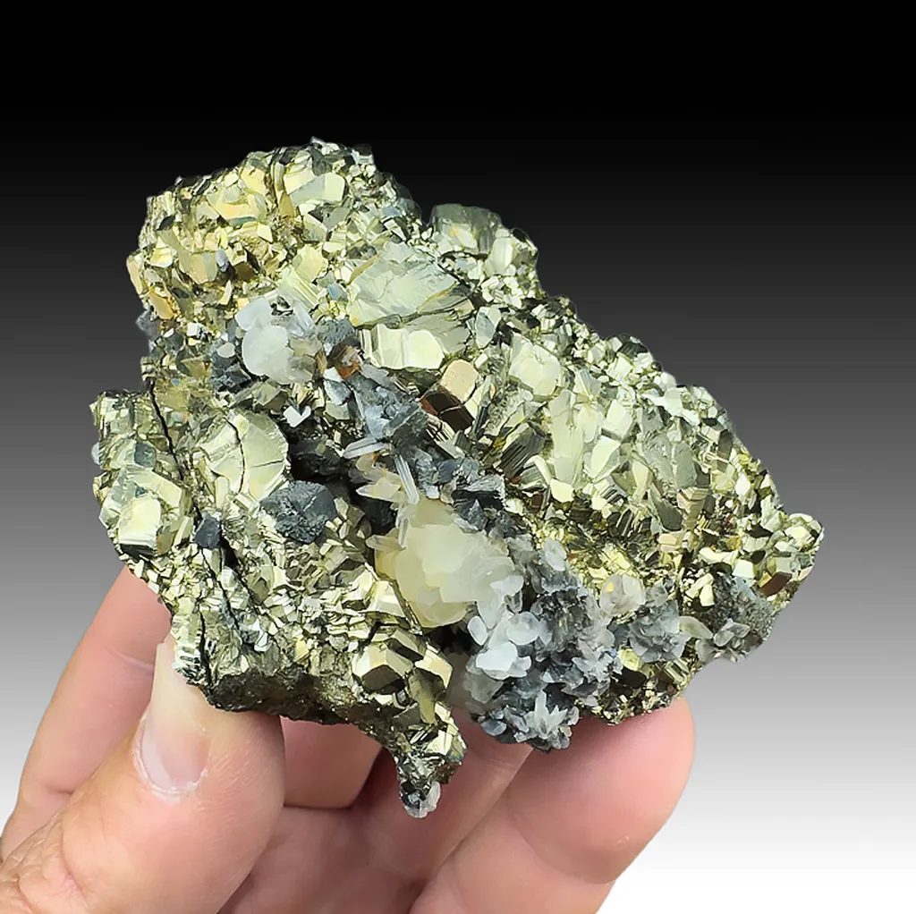 Pyrite after Pyrrhotite with Quartz, Calcite, Arsenopyrite image