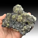 Pyrite after Pyrrhotite with Sphalerite, Calcite - image 1