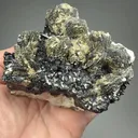 Pyrite after Pyrrhotite with Sphalerite, Calcite - image 2