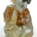 Pyrite on Grossular Garnet on Diopside - image 1