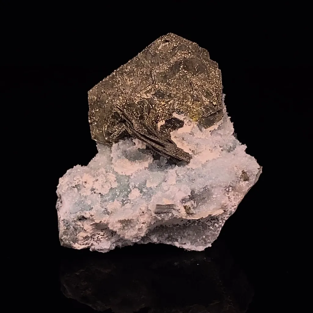 Pyrite ps. Pyrrhotite on Quartz image
