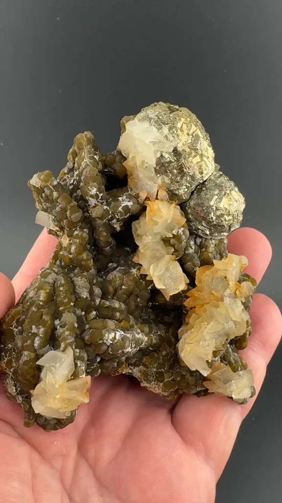 Pyrite with Siderite on Pyrite after Pyrrhotite, Calcite image