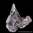 Pyrolusite on Rhodochrosite - image 1