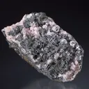 Pyrrhotite on Rhodochrosite - image 2