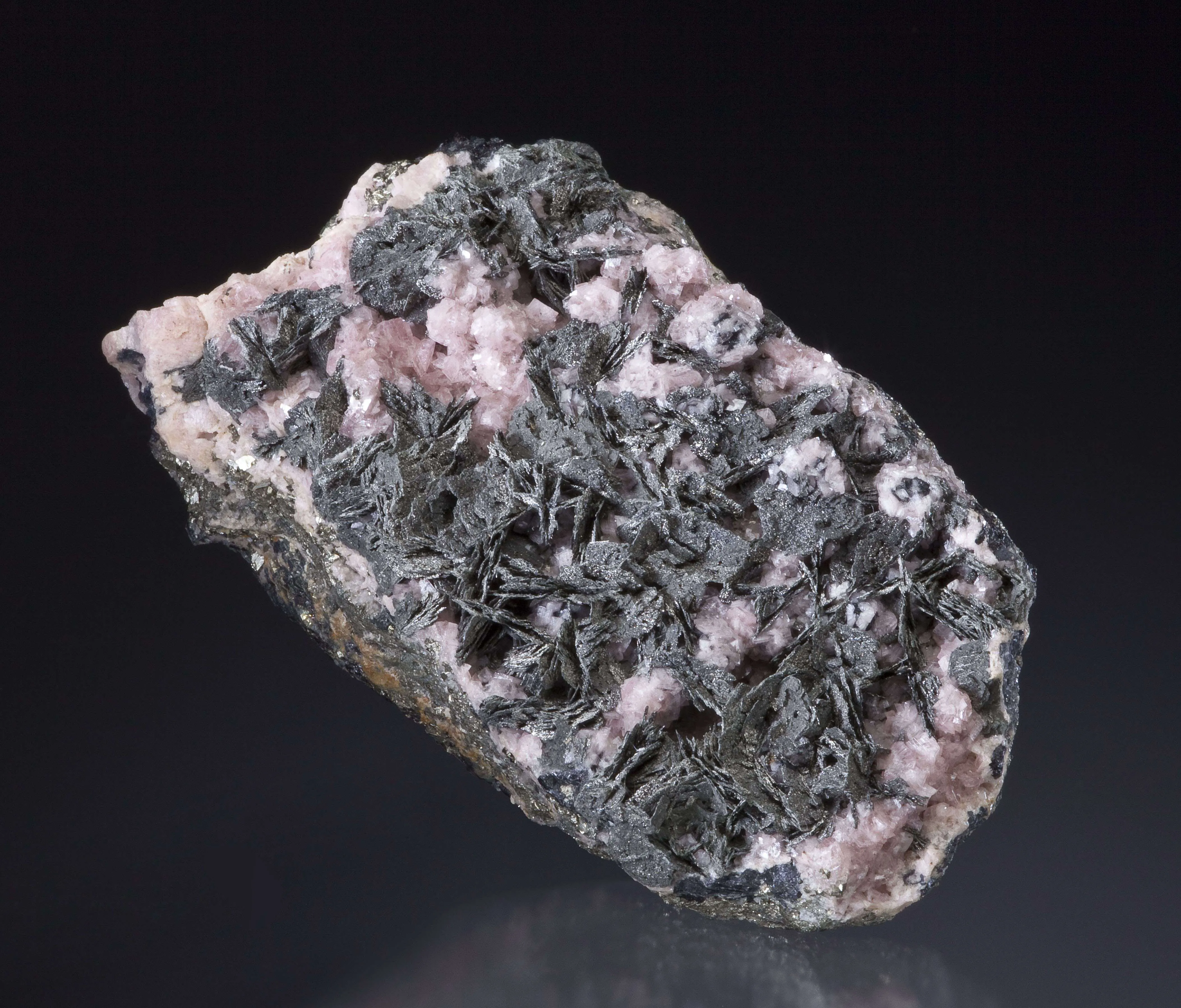 Pyrrhotite on Rhodochrosite - image 2