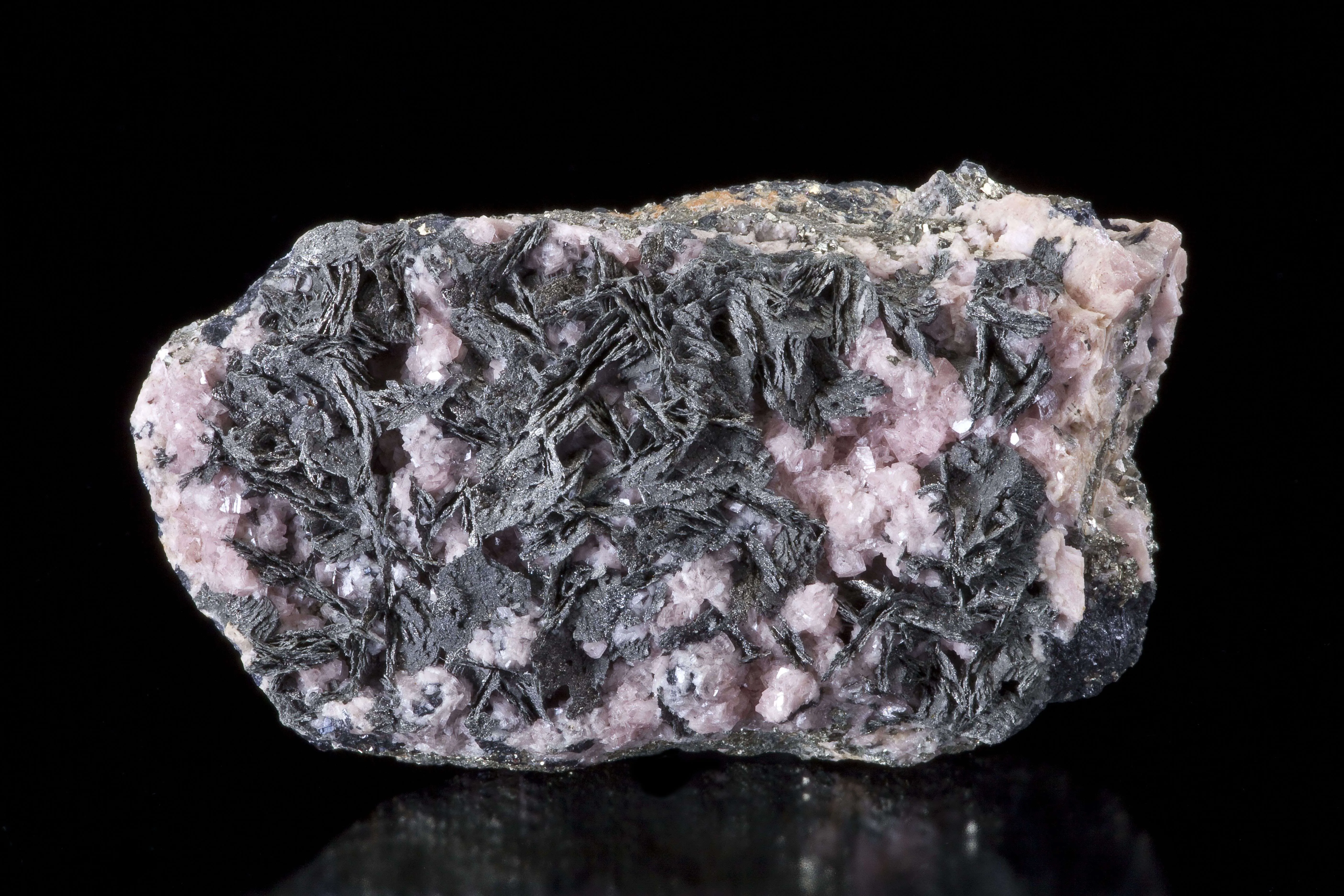 Pyrrhotite on Rhodochrosite - image 1
