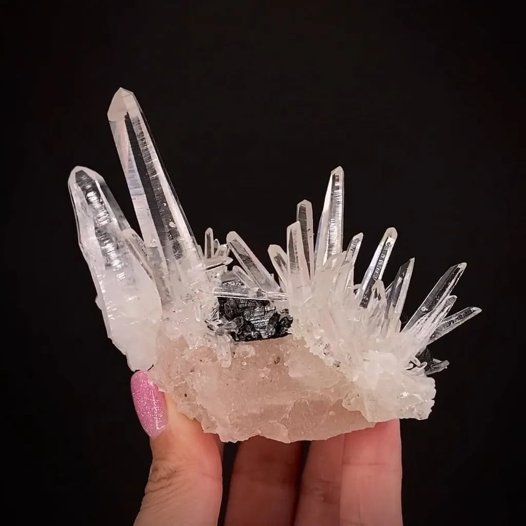 Quartz and Hubnerite on Fluorite image
