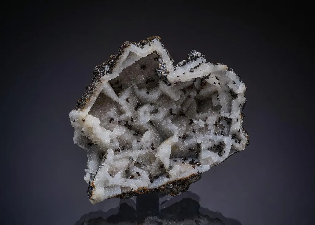 Quartz epimorph after Fluorite with Sphalerite and Siderite image