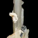 Quartz included by Hedenbergite, Hematite - image 3