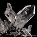 Quartz (Japan Law Twin) on Cassiterite - image 1