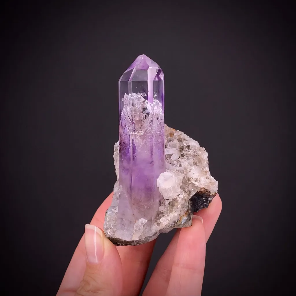 Quartz var. Amethyst with Calcite image