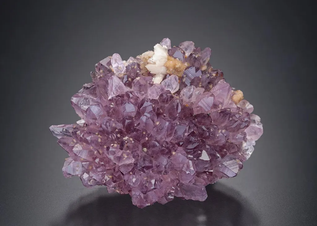 Quartz var. Amethyst with Dolomite and Calcite image