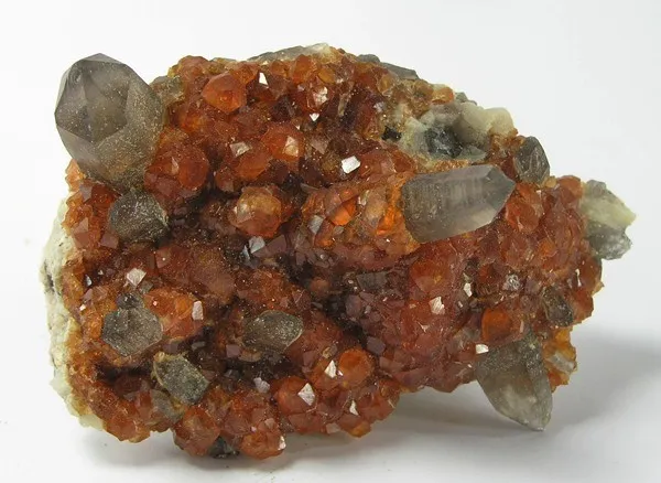 Quartz (Var: Smoky Quartz), Spessartine image