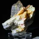 Quartz with golden mica and alurgite  red mica - image 1