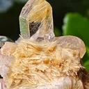 Quartz with golden rutile from Novo Horizonte, Brazil. Water-clear quartz points shot through with radiant sprays of golden rutile needles - image 1