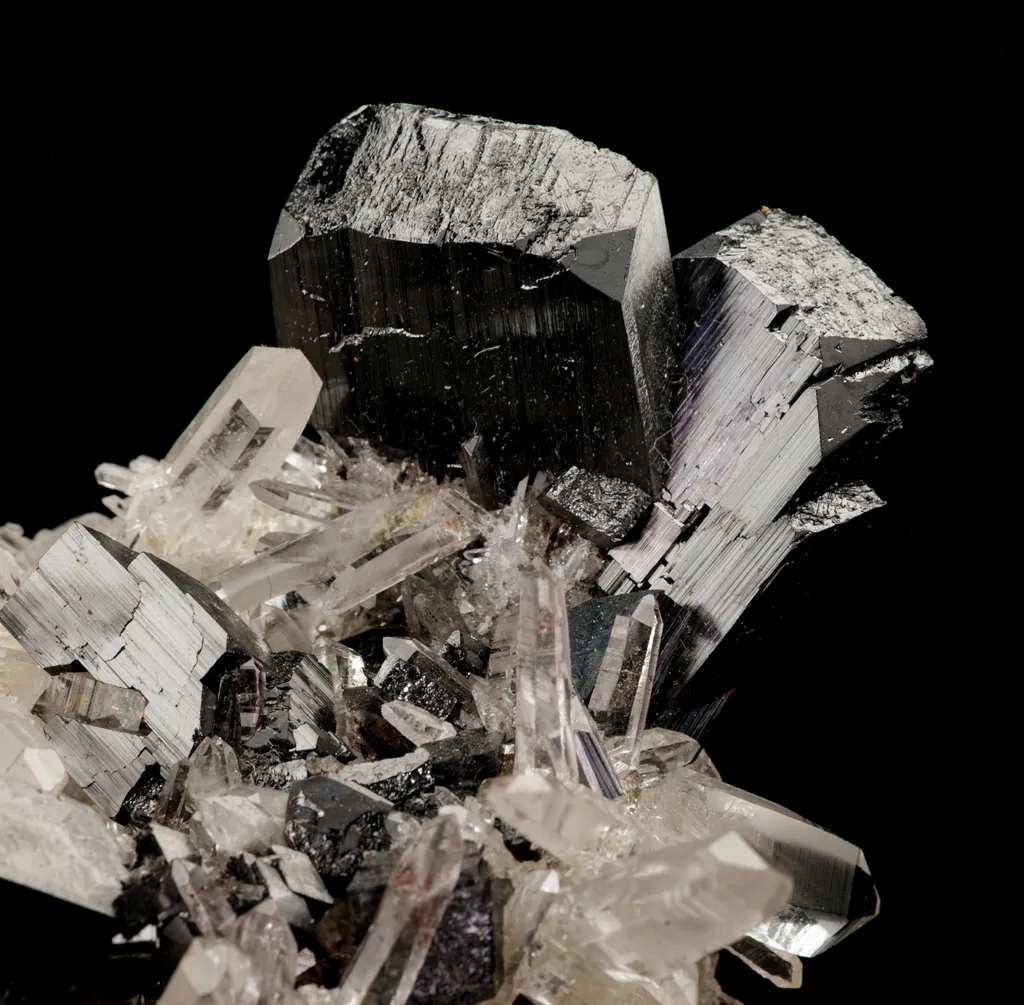 Quartz with Hubnerite on Pink Fluorite image