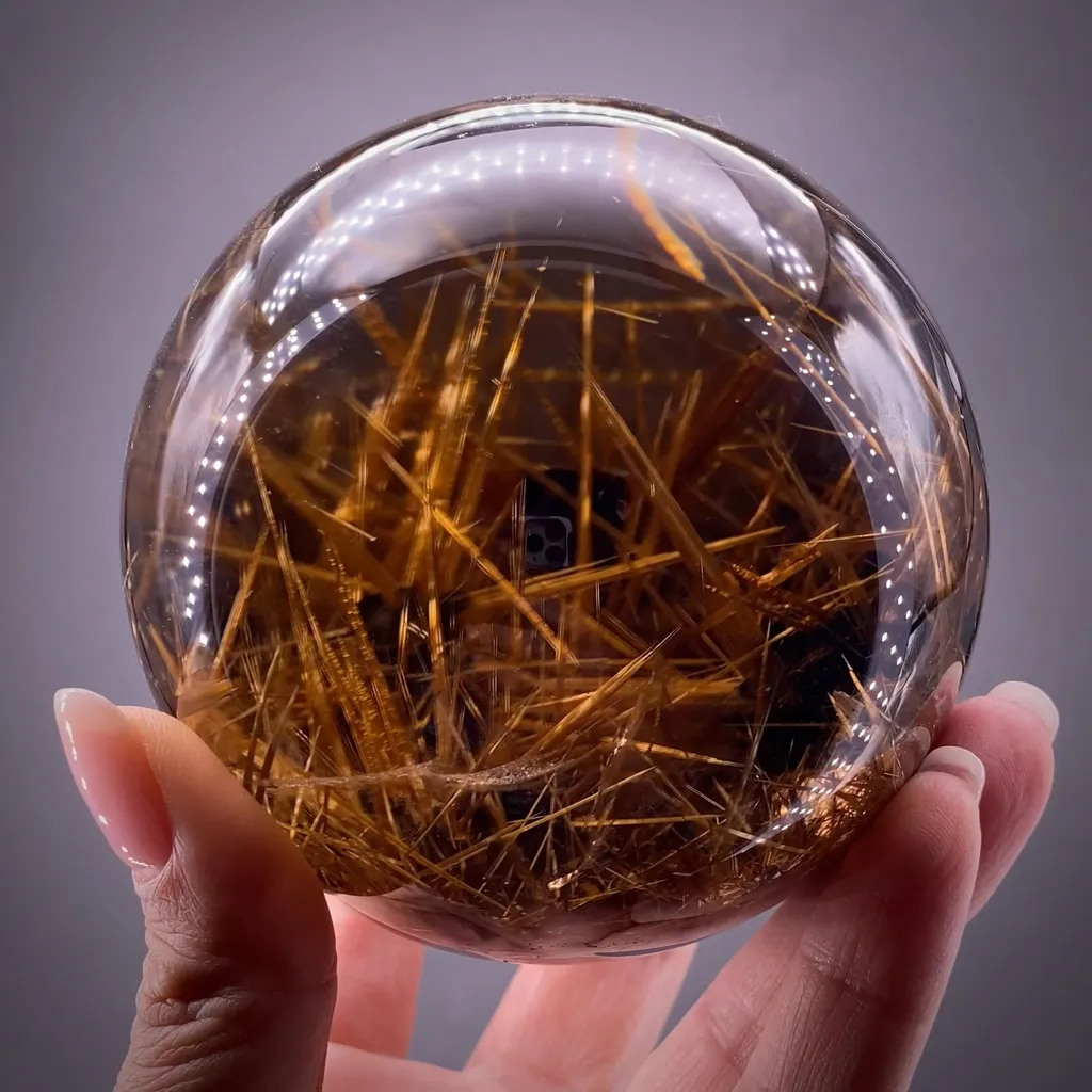 Quartz with Rutile and Hematite "star" inclusions image