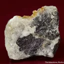 Quintinite-2H with Strontianite, Phlogopite, and Magnetite on carbonatite - image 2
