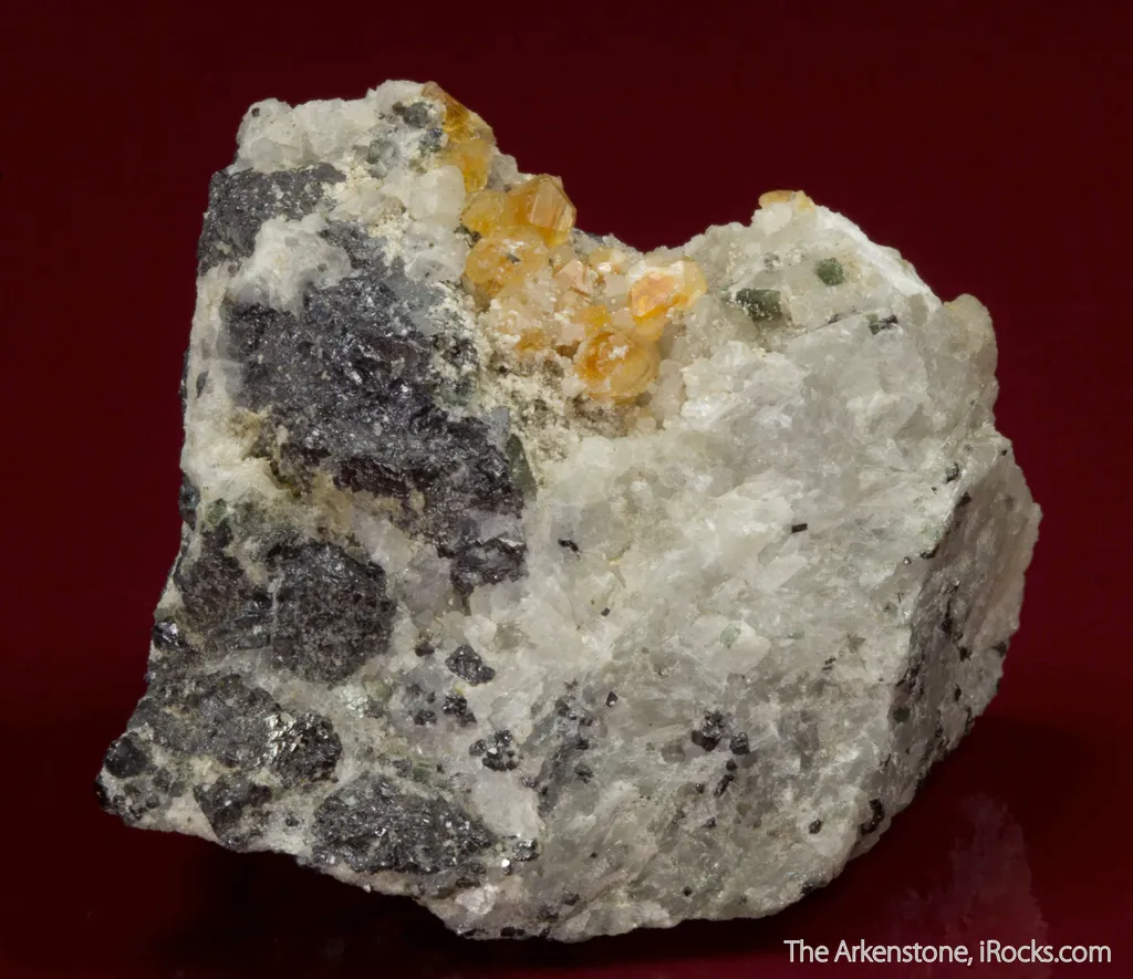 Quintinite-2H with Strontianite, Phlogopite, and Magnetite on carbonatite image