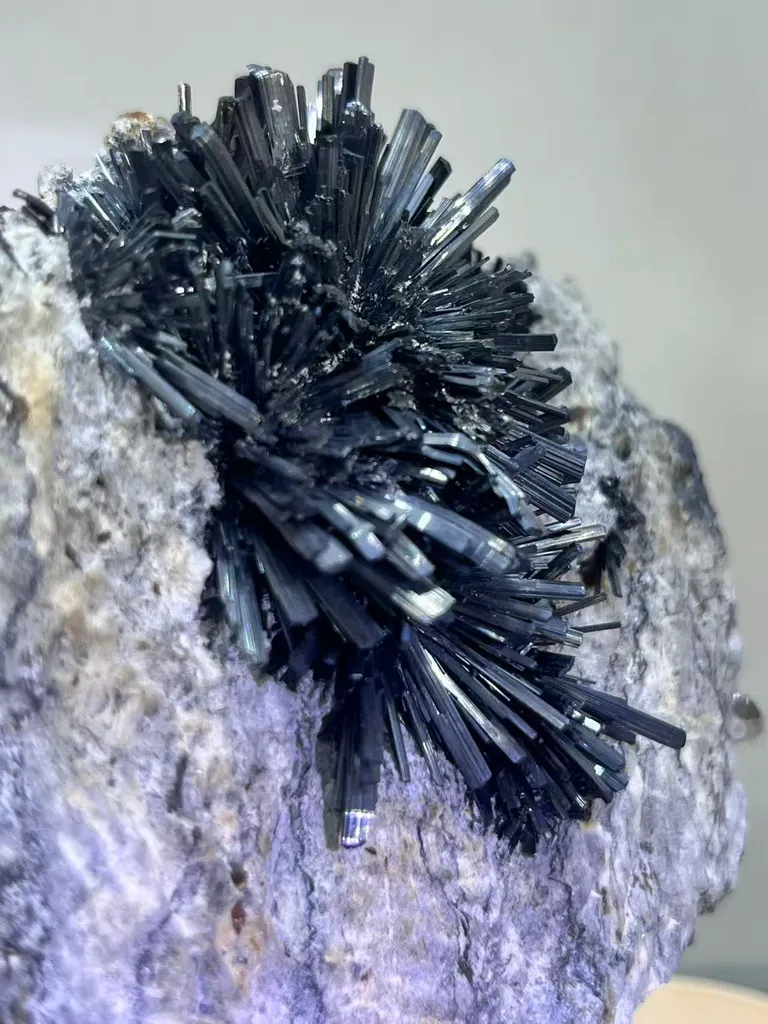 Radiant Spray‑Shaped Stibnite Cluster on Purple Fluorite Matrix, Xikuangshan Mine, Hunan, China - image 5