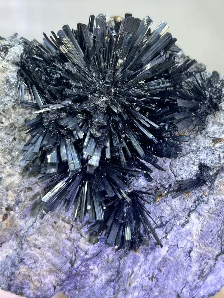 Radiant Spray‑Shaped Stibnite Cluster on Purple Fluorite Matrix, Xikuangshan Mine, Hunan, China - image 4