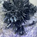 Radiant Spray‑Shaped Stibnite Cluster on Purple Fluorite Matrix, Xikuangshan Mine, Hunan, China - image 4